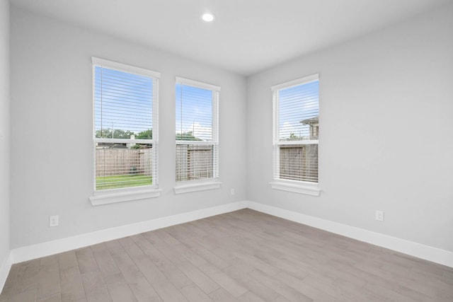 23507 Persimmon Creek Ln, Katy, TX 77493 - spare room featuring wood finished floors and recessed lighting