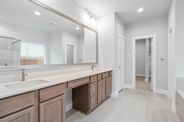 23507 Persimmon Creek Ln, Katy, TX 77493 - bathroom with double vanity, recessed lighting, and a shower with door