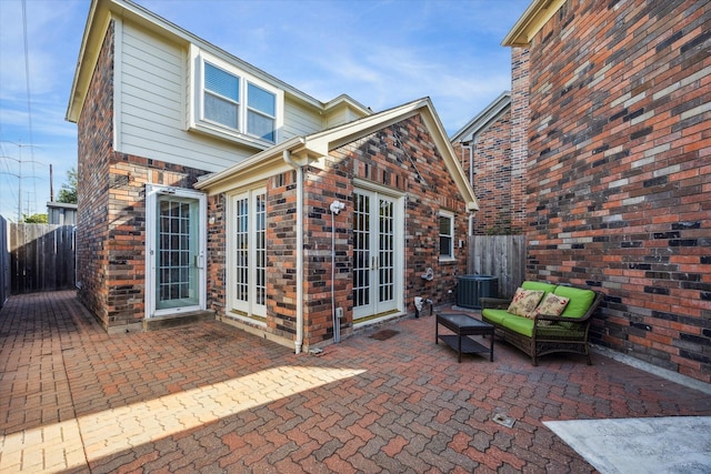 4106 Childress St, Houston, TX 77005 - view of patio / terrace with french doors, an outdoor hangout area, and central AC unit
