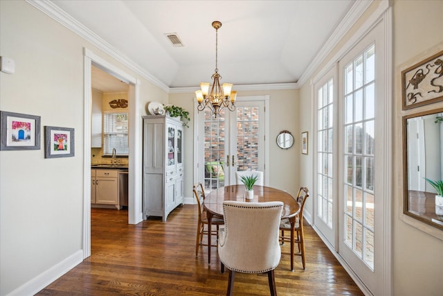 4106 Childress St, Houston, TX 77005 - dining area featuring crown molding, visible vents, a chandelier, dark wood-style flooring, and french doors