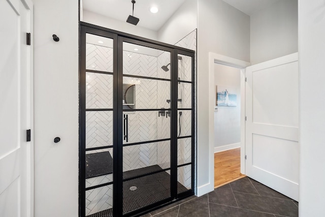 foyer entrance with dark tile patterned flooring