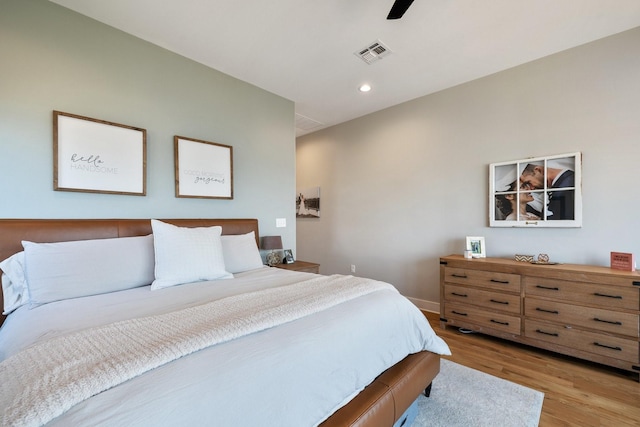 bedroom featuring light wood-type flooring, baseboards, visible vents, recessed lighting, and ceiling fan
