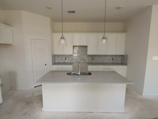 26239 Astral Way, La Marque, TX 77568 - kitchen with backsplash, concrete flooring, and white cabinetry