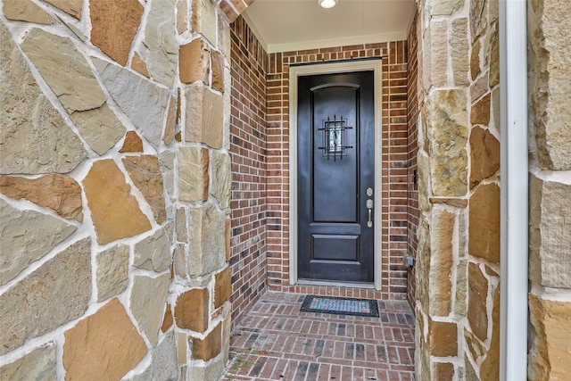 23509 Red Juniper Ln, New Caney, TX 77357 - doorway to property with brick siding
