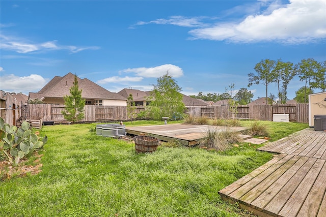 23509 Red Juniper Ln, New Caney, TX 77357 - view of yard featuring a deck and a residential view