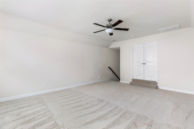 23509 Red Juniper Ln, New Caney, TX 77357 - unfurnished room with a ceiling fan, light carpet, baseboards, and lofted ceiling