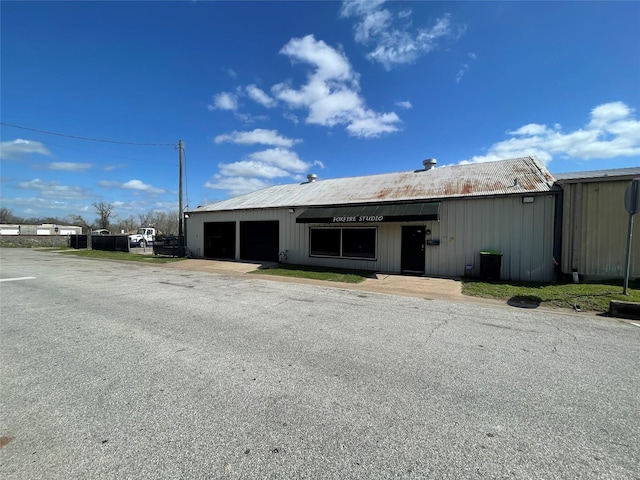105 S 2nd St, Richmond, TX 77469 - view of front of home featuring an attached garage