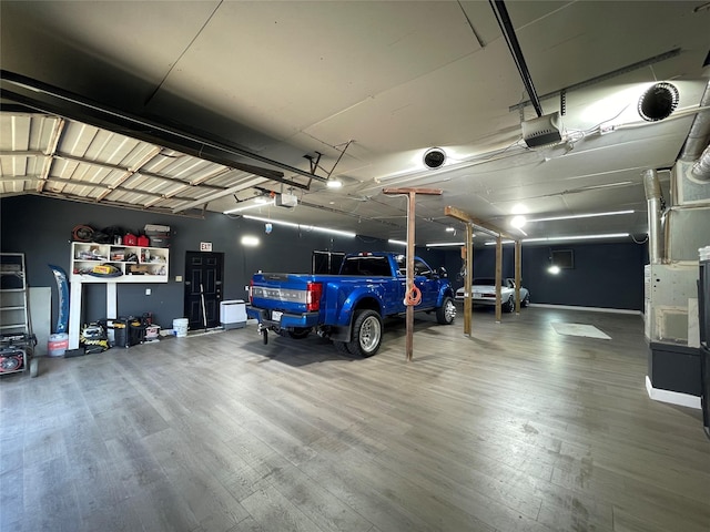105 S 2nd St, Richmond, TX 77469 - garage featuring a garage door opener