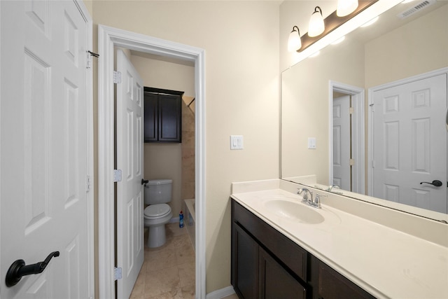 bathroom featuring visible vents, baseboards, toilet, tile patterned floors, and vanity