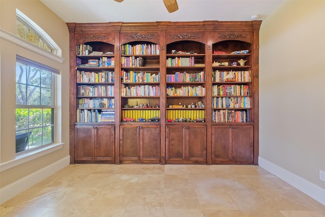 5206 Briarwick Meadow Ln, Sugar Land, TX 77479 - unfurnished office with baseboards and a ceiling fan