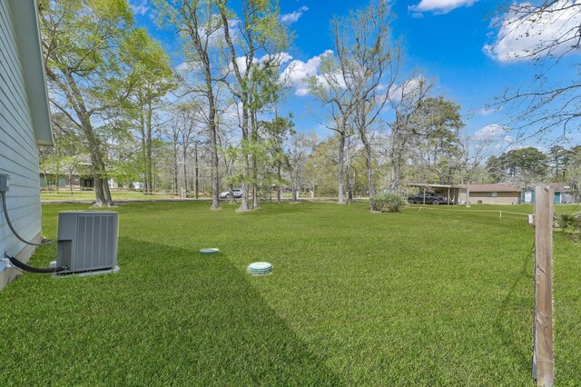 view of yard featuring cooling unit
