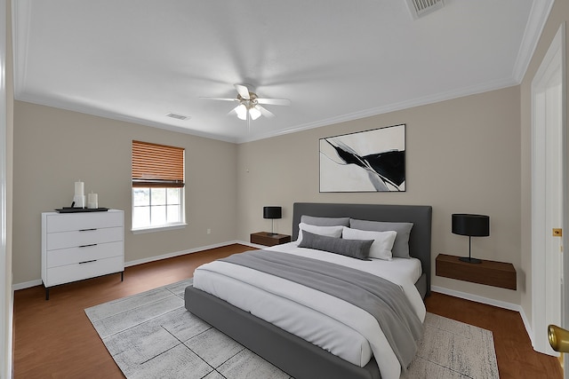 1015 Chickasaw Dr, Montgomery, TX 77316 - bedroom with wood finished floors, ornamental molding, and ceiling fan