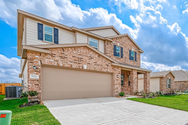 view of front of home featuring brick siding, central AC unit, a front lawn, and concrete driveway