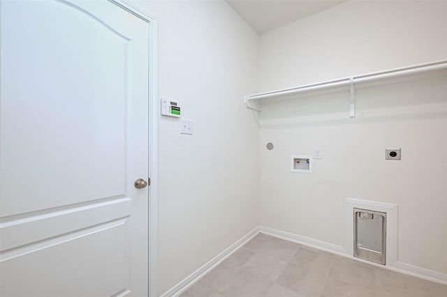 laundry room featuring laundry area, hookup for a washing machine, gas dryer hookup, baseboards, and electric dryer hookup