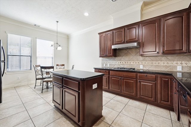 3031 Royal Oaks Grv, Houston, TX 77082 - kitchen featuring under cabinet range hood, dark countertops, light tile patterned floors, a chandelier, and recessed lighting