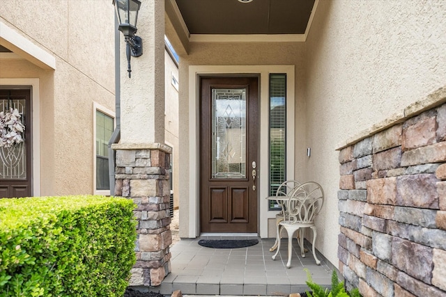 3031 Royal Oaks Grv, Houston, TX 77082 - doorway to property with stucco siding