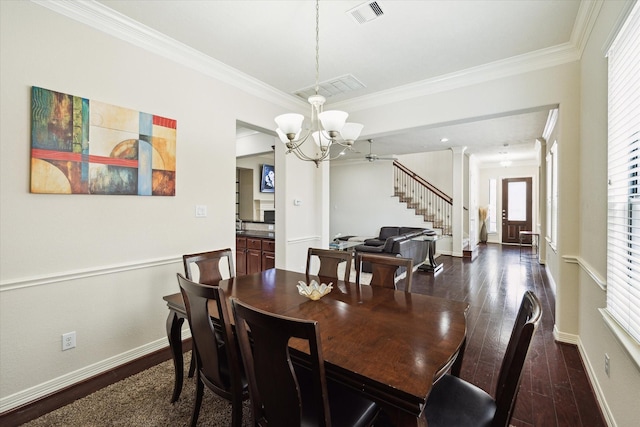3031 Royal Oaks Grv, Houston, TX 77082 - dining room with a chandelier, crown molding, dark wood finished floors, stairs, and baseboards