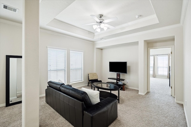 3031 Royal Oaks Grv, Houston, TX 77082 - living area featuring light colored carpet, ornamental molding, a raised ceiling, and ceiling fan