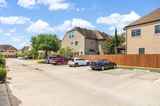 3031 Royal Oaks Grv, Houston, TX 77082 - uncovered parking lot featuring a residential view