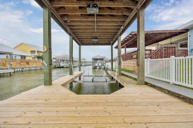 dock area featuring a water view and boat lift