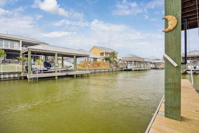 view of dock with a water view