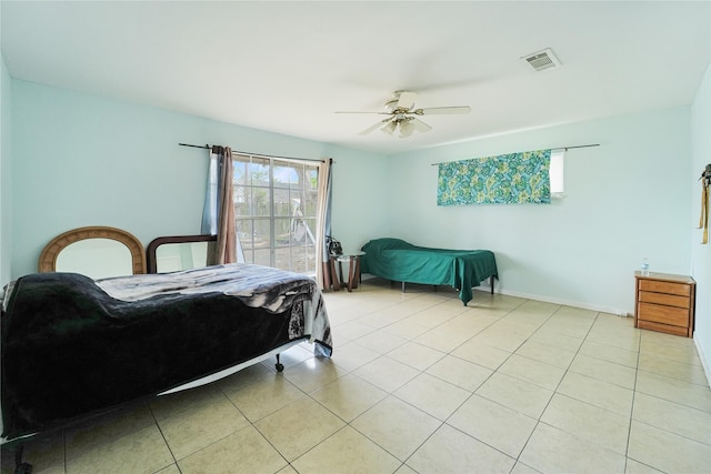 bedroom featuring ceiling fan, visible vents, baseboards, and light tile patterned flooring