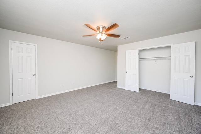 6514 Kentwick Dr, Houston, TX 77084 - unfurnished bedroom featuring a closet, baseboards, carpet floors, visible vents, and ceiling fan