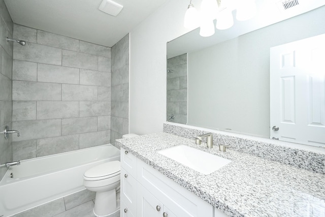 6514 Kentwick Dr, Houston, TX 77084 - full bathroom featuring visible vents, toilet,  shower combination, vanity, and tile patterned floors