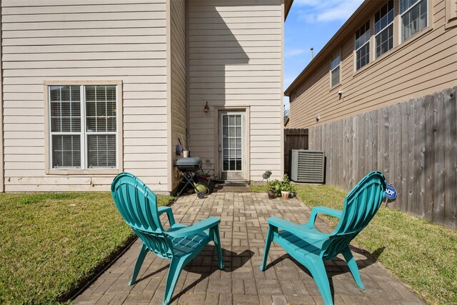 view of patio with fence