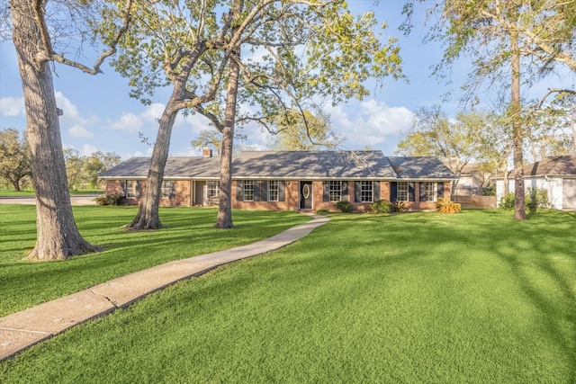101 Royal Ct, Friendswood, TX 77546 - ranch-style home featuring brick siding and a chimney
