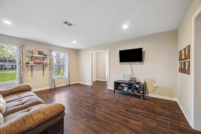 101 Royal Ct, Friendswood, TX 77546 - living area with healthy amount of natural light, wood finished floors, baseboards, and recessed lighting