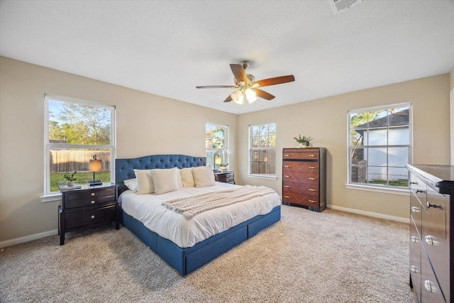 101 Royal Ct, Friendswood, TX 77546 - bedroom with baseboards, carpet floors, and a ceiling fan