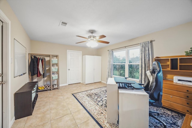 101 Royal Ct, Friendswood, TX 77546 - home office featuring a ceiling fan, light tile patterned floors, and baseboards