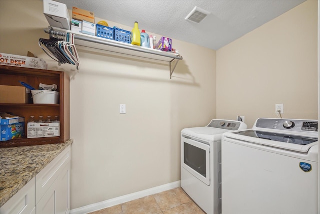 101 Royal Ct, Friendswood, TX 77546 - laundry room with washer and clothes dryer, light tile patterned floors, and baseboards
