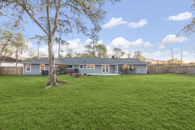 101 Royal Ct, Friendswood, TX 77546 - back of property featuring french doors, central AC unit, and a patio area