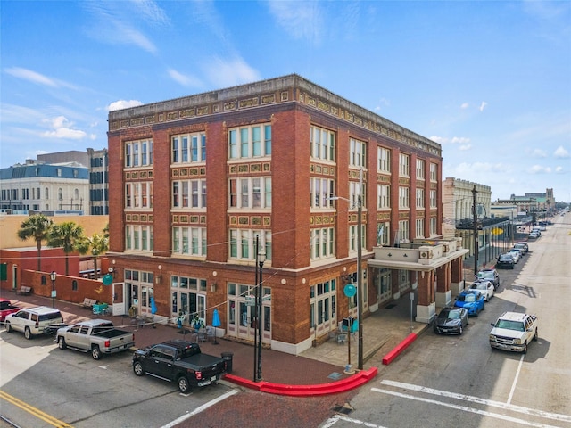 2425 Strand St, Galveston, TX 77550 - view of building exterior with uncovered parking