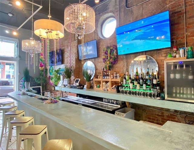 2425 Strand St, Galveston, TX 77550 - bar area with a chandelier and brick wall