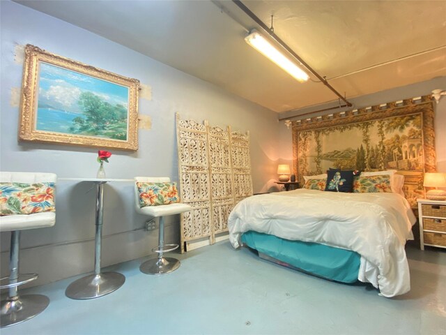 2425 Strand St, Galveston, TX 77550 - bedroom with concrete floors