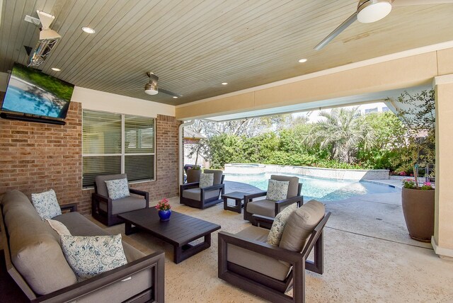 view of patio with an outdoor living space, a ceiling fan, and a pool with connected hot tub