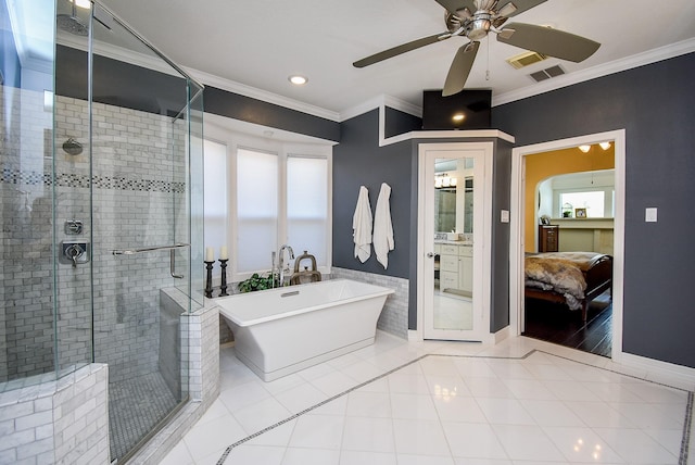 bathroom with a ceiling fan, a stall shower, crown molding, and tile patterned flooring