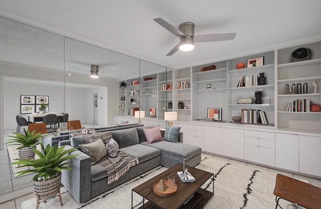 living room with built in shelves, light tile patterned flooring, and a ceiling fan
