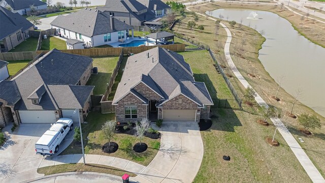 30527 Agave Circle Ct, Brookshire, TX 77423 - aerial perspective of suburban area with a large body of water