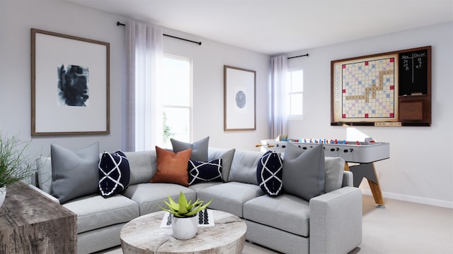 carpeted living room featuring baseboards