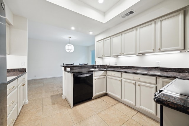 259 Litchfield Ln Unit 66, Houston, TX 77024 - kitchen with black dishwasher, a sink, a peninsula, recessed lighting, and hanging light fixtures