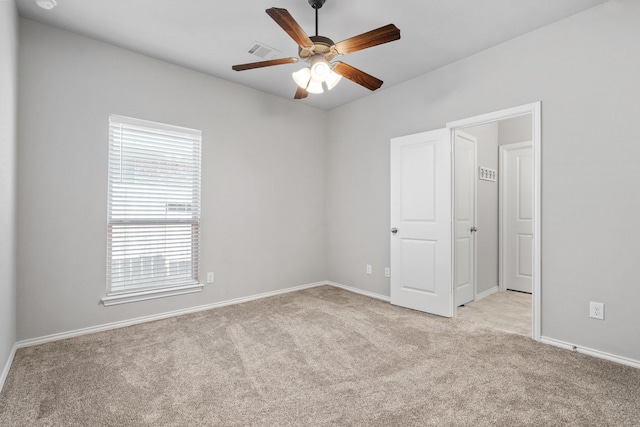 156 Buckeye Dr, Montgomery, TX 77316 - unfurnished bedroom featuring baseboards, light carpet, and visible vents