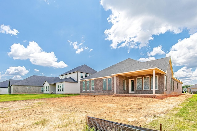 197 Peninsula Point Dr, Montgomery, TX 77356 - back of house featuring brick siding