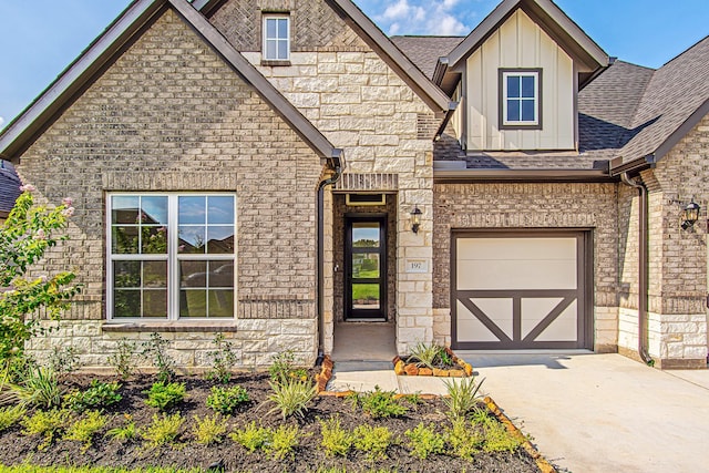 197 Peninsula Point Dr, Montgomery, TX 77356 - view of front facade featuring board and batten siding, driveway, roof with shingles, and brick siding