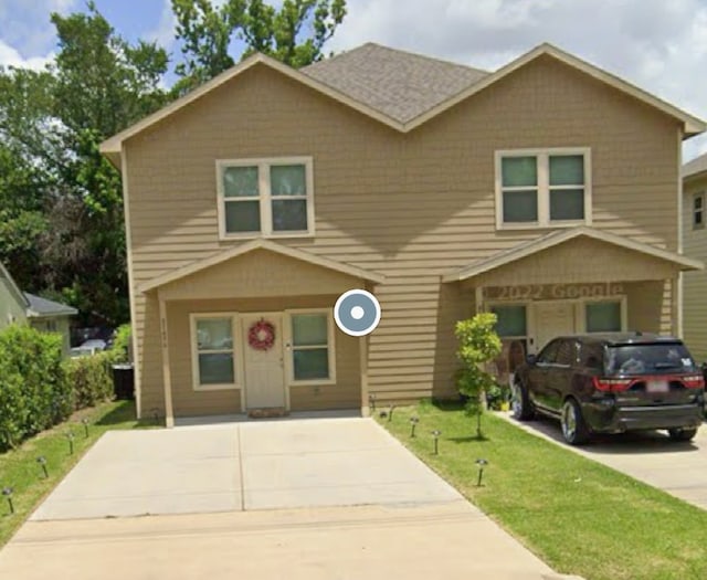 8149 Homewood Ln, Houston, TX 77028 - view of front of property featuring a front lawn and driveway