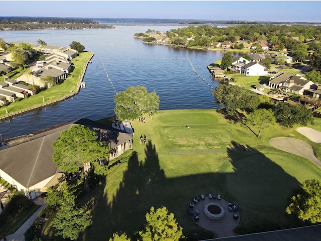 drone / aerial view with a residential view and a water view