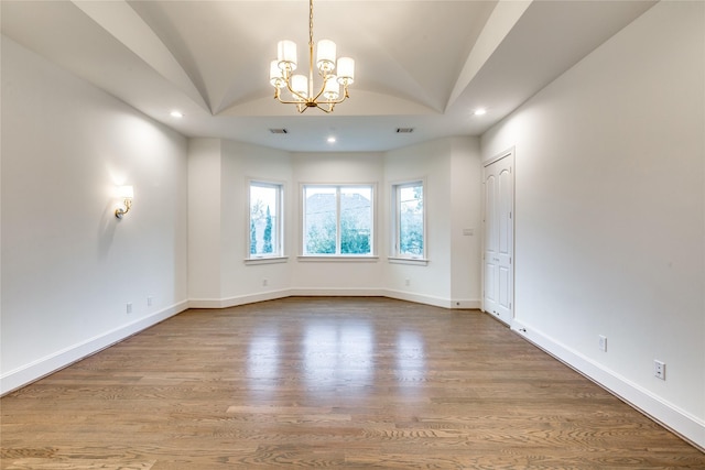 3302 Elmridge St, Houston, TX 77025 - unfurnished room featuring vaulted ceiling, a notable chandelier, recessed lighting, and wood finished floors